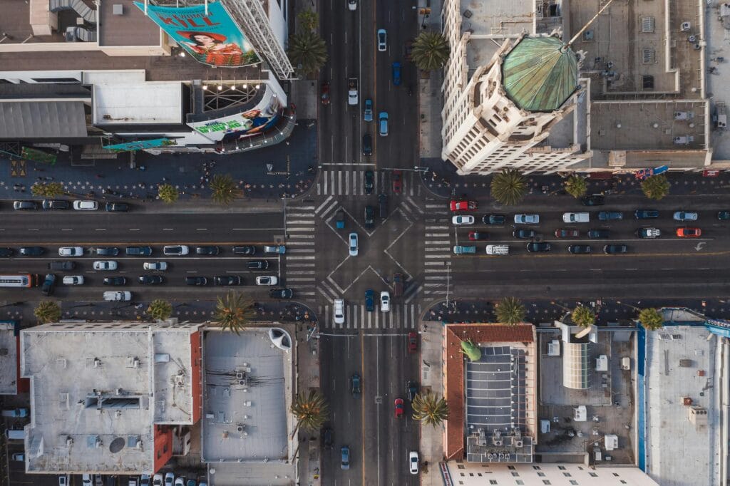 Aerial view of a busy intersection at Hollywood Boulevard in Los Angeles, showcasing urban life.